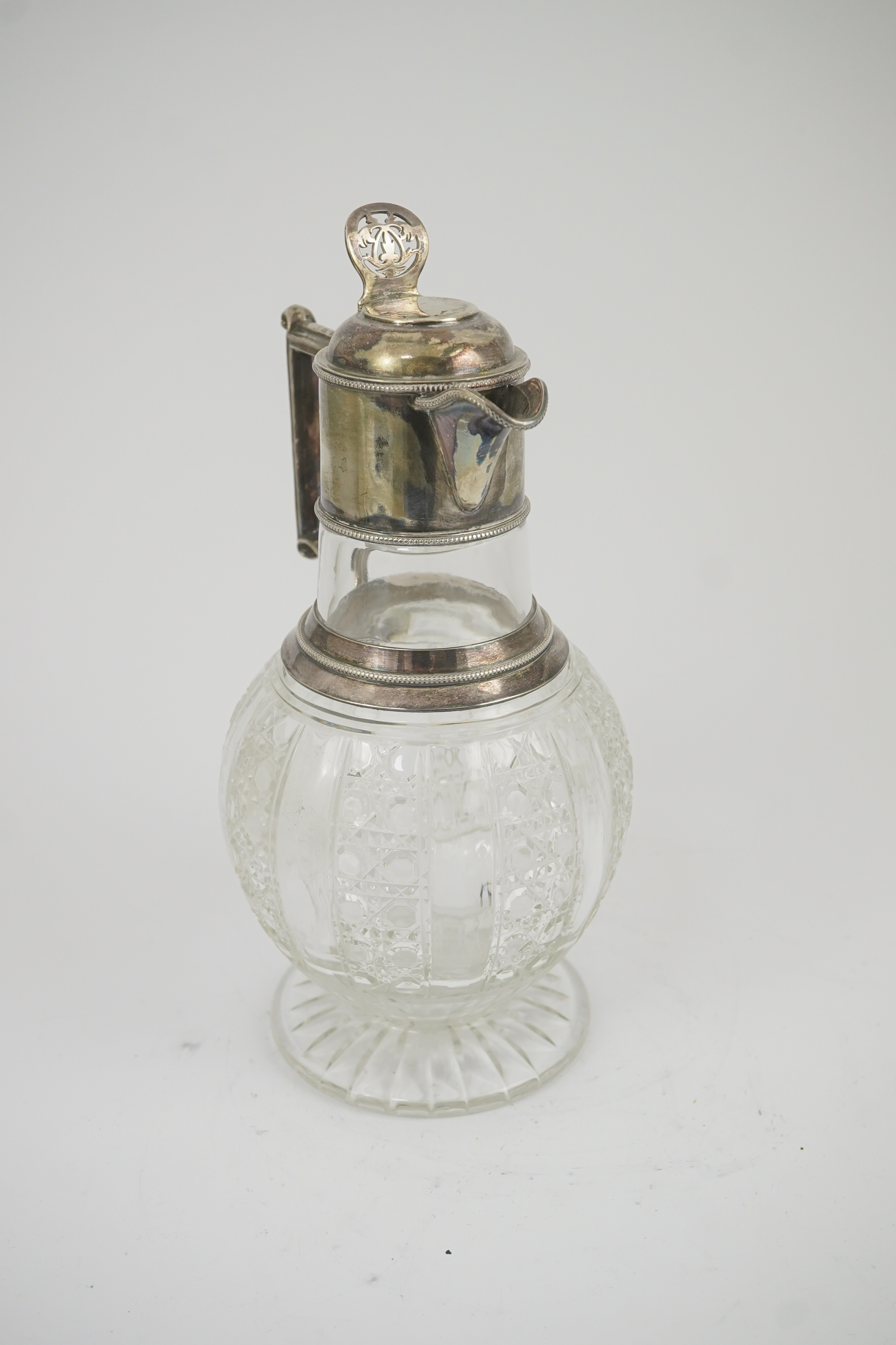 A late Victorian silver mounted cut glass claret jug, by Edward Hutton